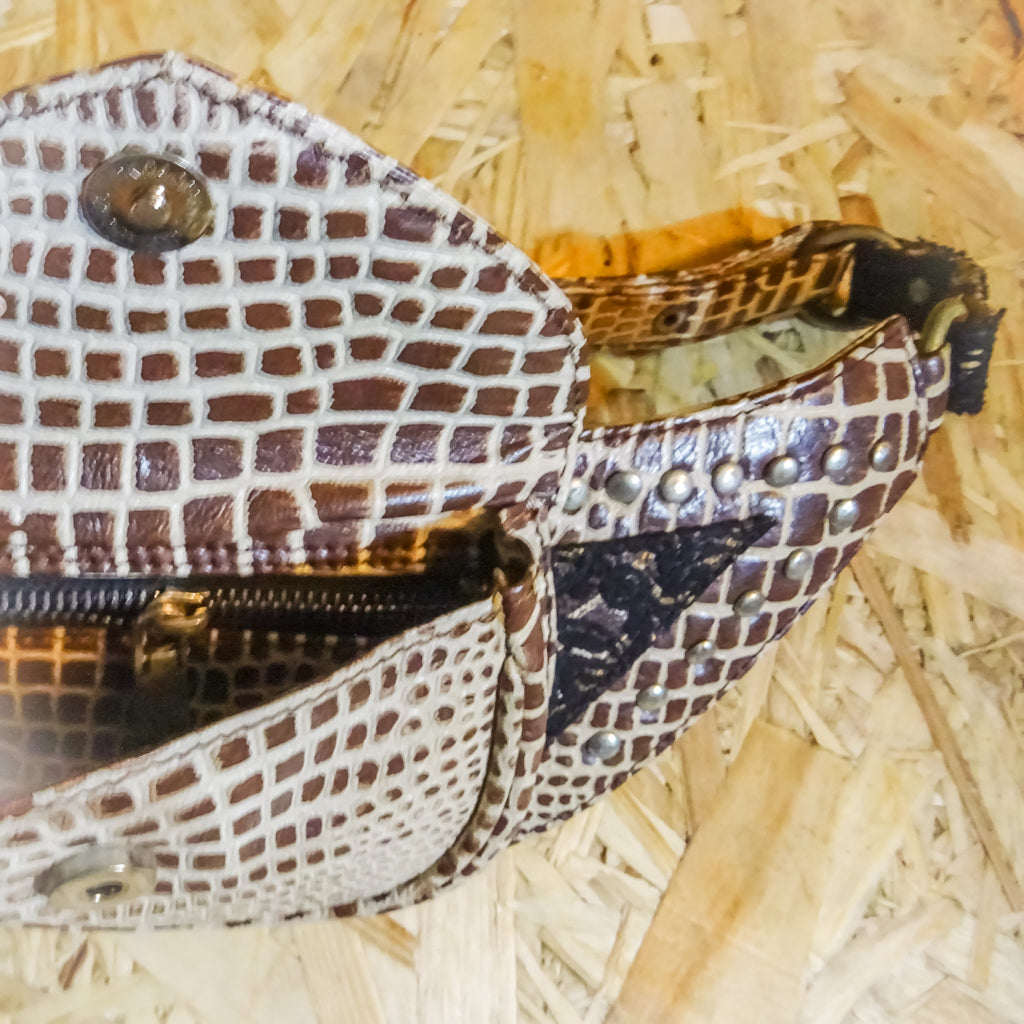 Alva pouch ,leather utility belt , giraffe pattern with silver studs and leather tussles