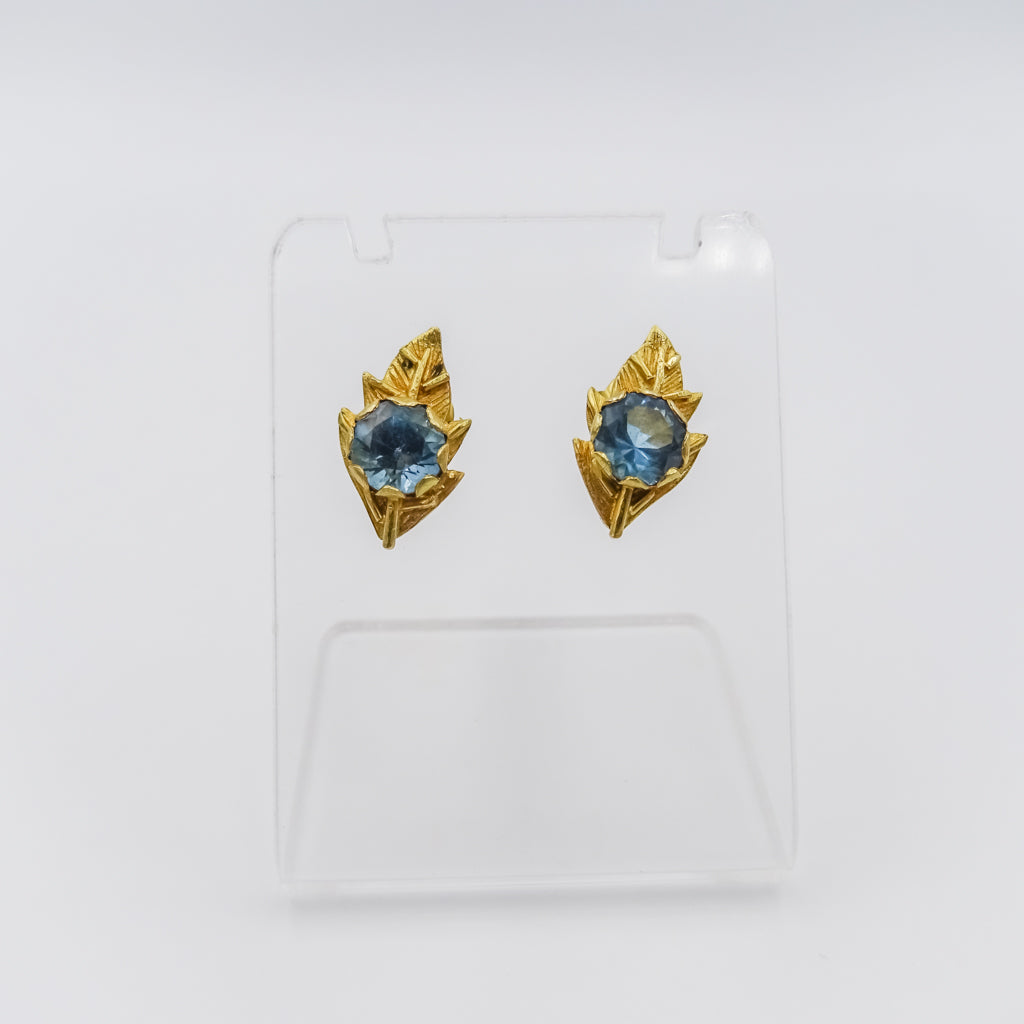 Nature's Serenity: 18K Gold Leaf-Shaped Earrings with Blue Topaz Gemstone