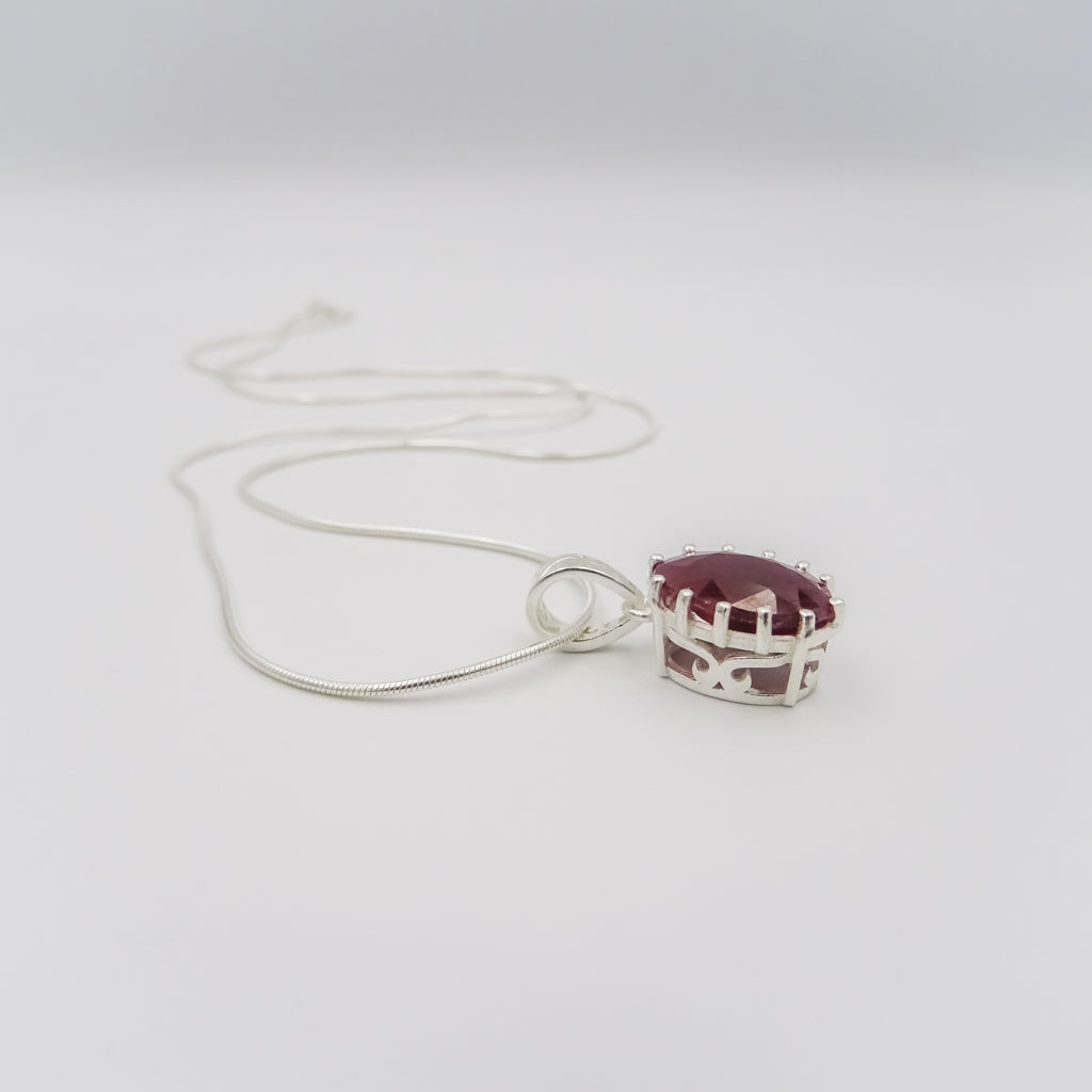 Silver Necklace with Curved Ruby Pendant