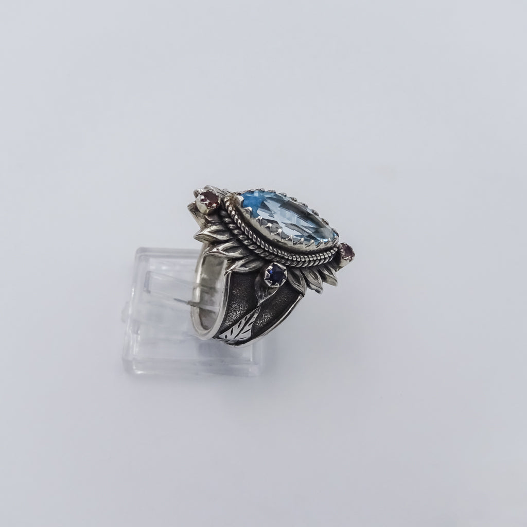 Lotus-Inspired Silver Ring with Blue Topaz, Tourmaline, and Sapphire Accents