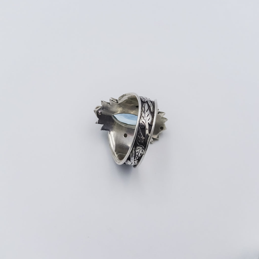 Lotus-Inspired Silver Ring with Blue Topaz, Tourmaline, and Sapphire Accents