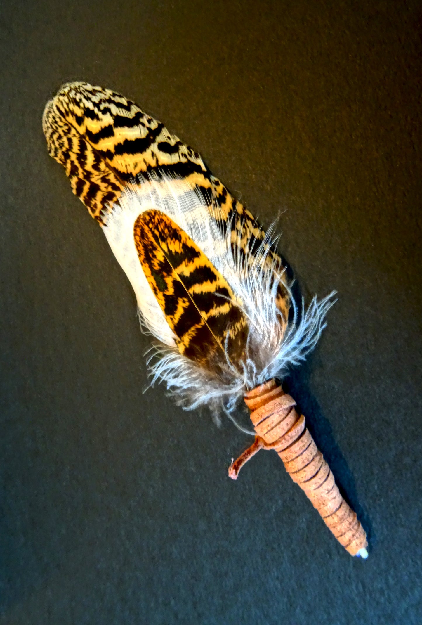 small sacred smudging fan, natural feathers