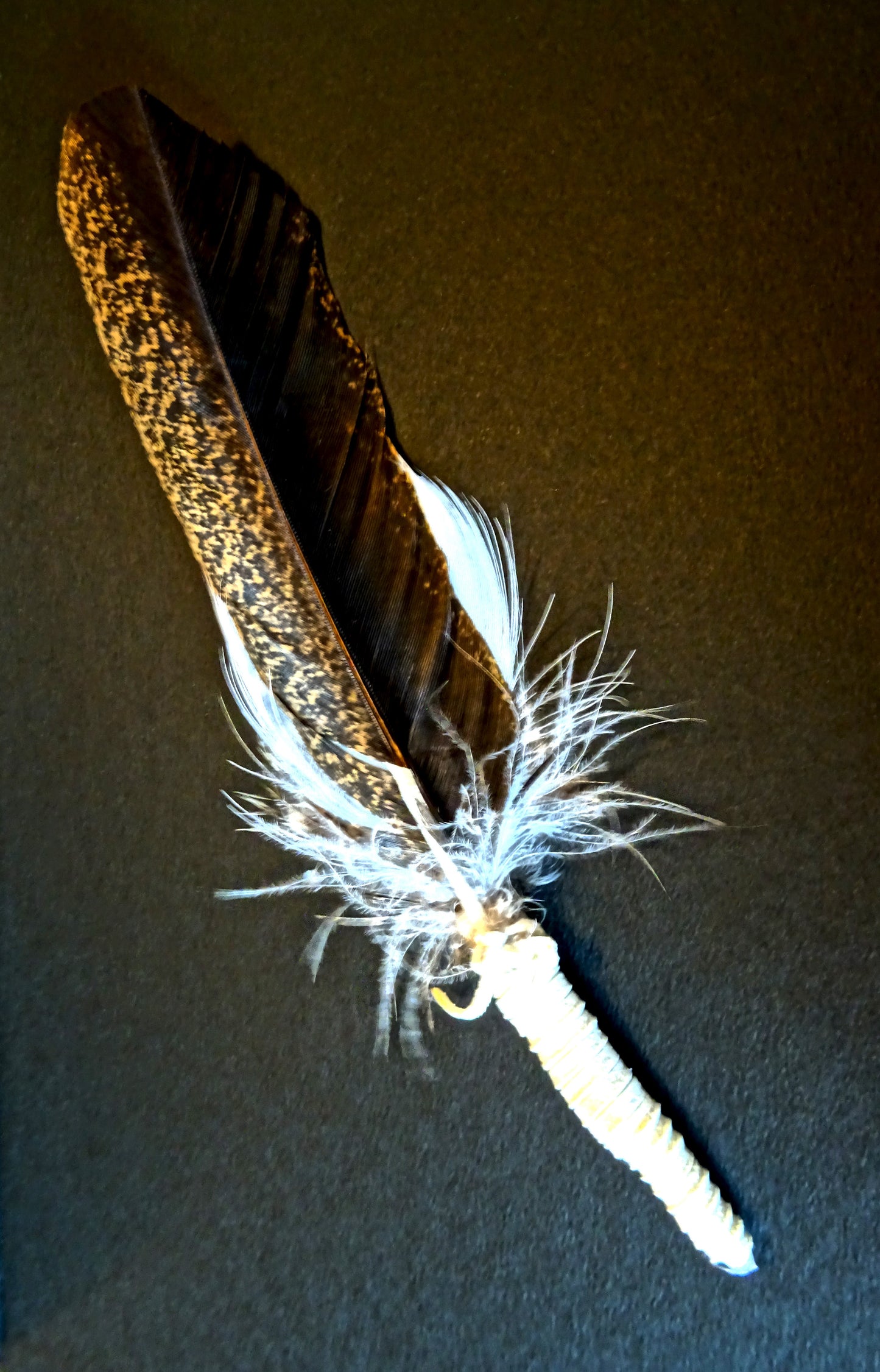 small sacred smudging fan, natural feathers