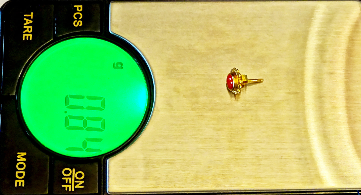 18k gold stud earring with gemstones red coral set in a flower shape