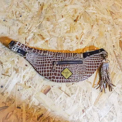 Alva pouch ,leather utility belt , giraffe pattern with silver studs and leather tussles