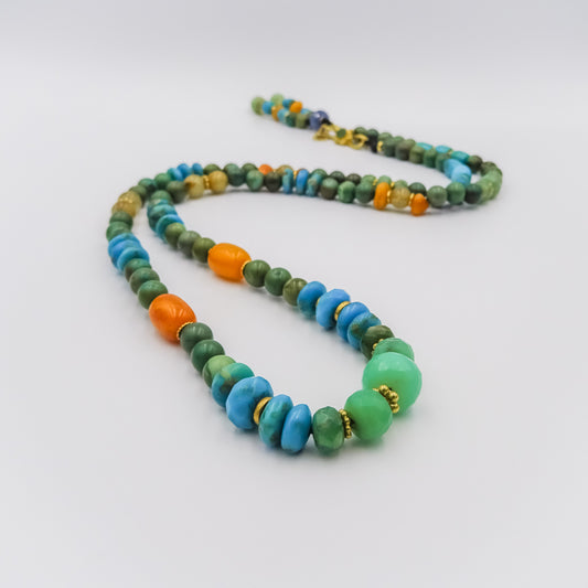 beaded necklace with 18k gold spacers,Chrisophrase,turquise,embar,rutile,sapphire and emerald
