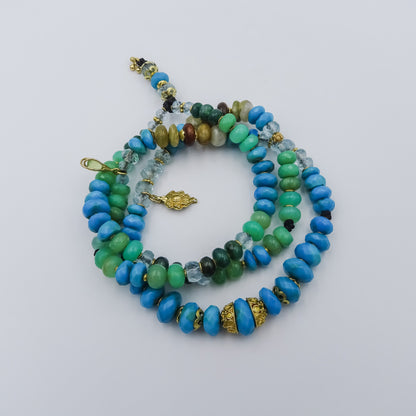 beaded necklace with 18k gold spacing,arizonian turquise,chrisophras,aqua marine,peruvian opal