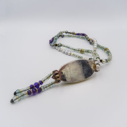 beaded necklace with 18k gold spacing,mother of pearl pendant,aqua marine,amethyst,silver&black pearls