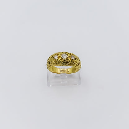 18k gold ring with three diamonds