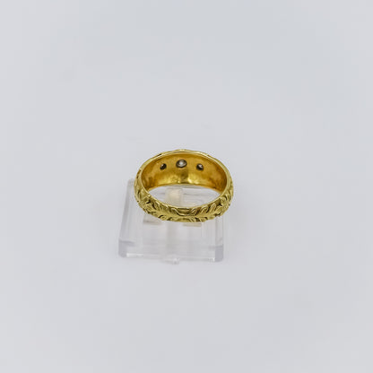 18k gold ring with three diamonds