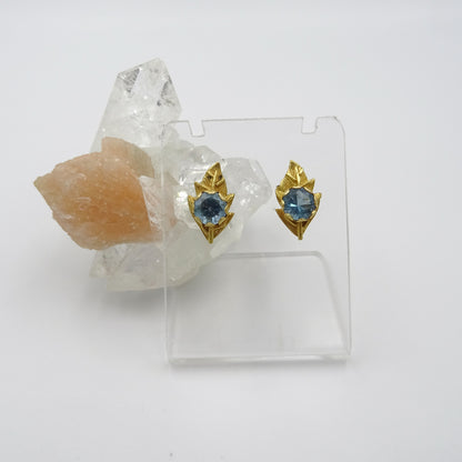 Nature's Serenity: 18K Gold Leaf-Shaped Earrings with Blue Topaz Gemstone