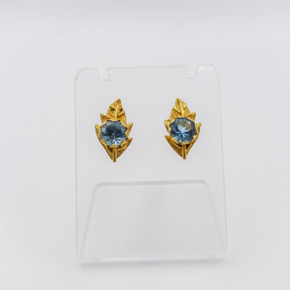 Nature's Serenity: 18K Gold Leaf-Shaped Earrings with Blue Topaz Gemstone