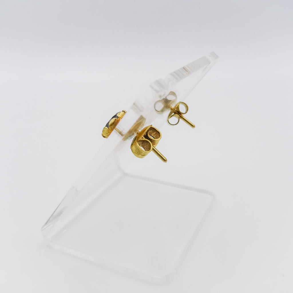 Nature's Serenity: 18K Gold Leaf-Shaped Earrings with Blue Topaz Gemstone