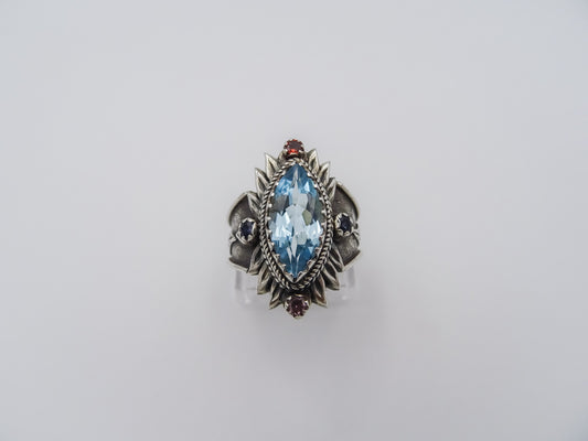 Lotus-Inspired Silver Ring with Blue Topaz, Tourmaline, and Sapphire Accents