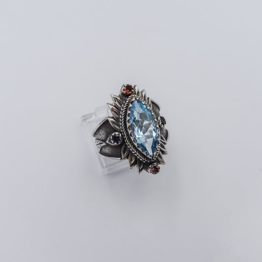 Lotus-Inspired Silver Ring with Blue Topaz, Tourmaline, and Sapphire Accents