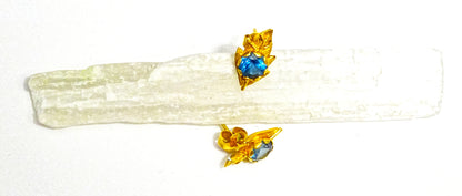 "Nature's Serenity: 18K Gold Leaf-Shaped Earrings with Blue Topaz Gemstones"