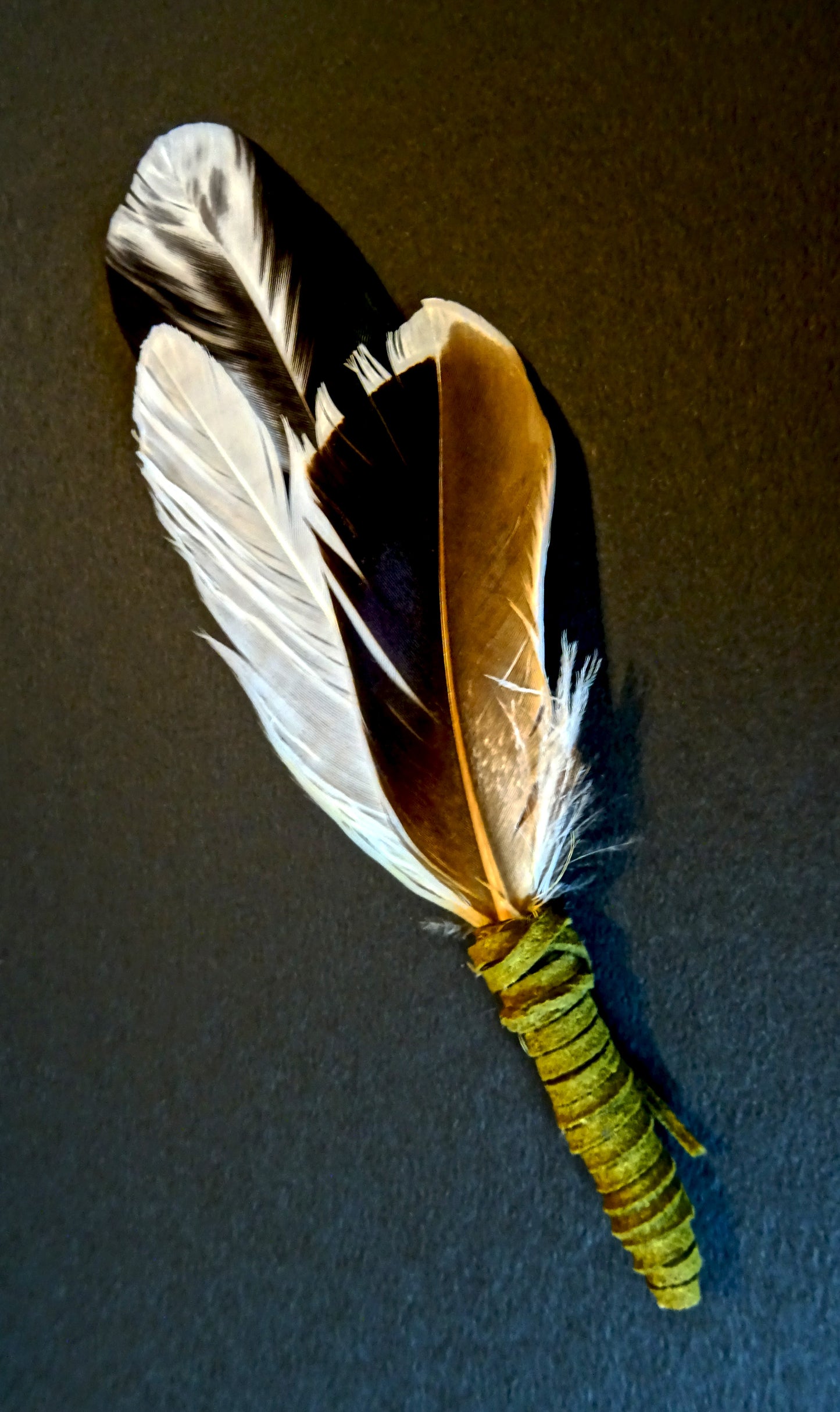 small sacred smudging fan, natural feathers