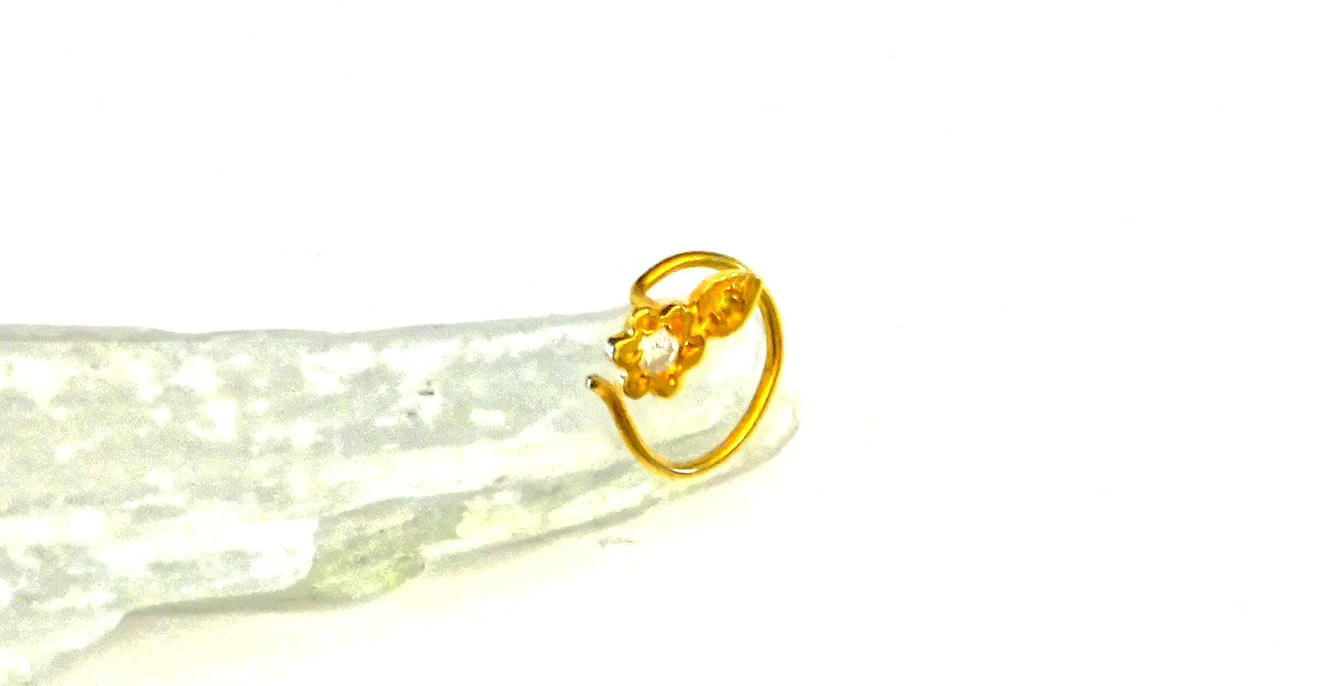 18k gold spiral nose ring with diamond