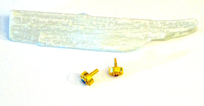 18k gold stud earring with gemstones Dabble sided ,set with ruby and sapphire