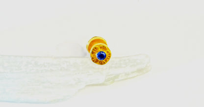 18k gold stud earring with gemstones Dabble sided ,set with emerald and sapphire