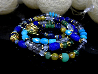 Mala necklace with 22 karat gold and gem stones,turquoise,lapis,aquamarine,diamond and emerald