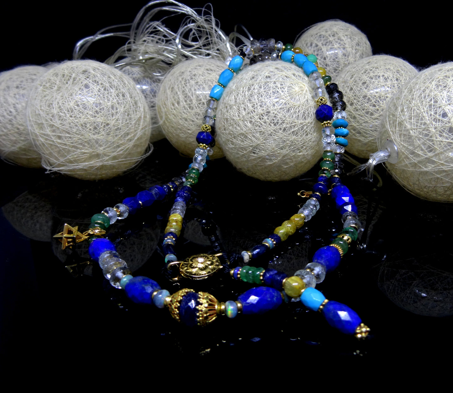 Mala necklace with 22 karat gold and gem stones,turquoise,lapis,aquamarine,diamond and emerald